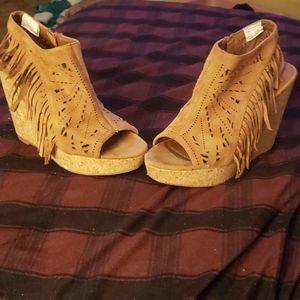 Barely worn fringed wedges